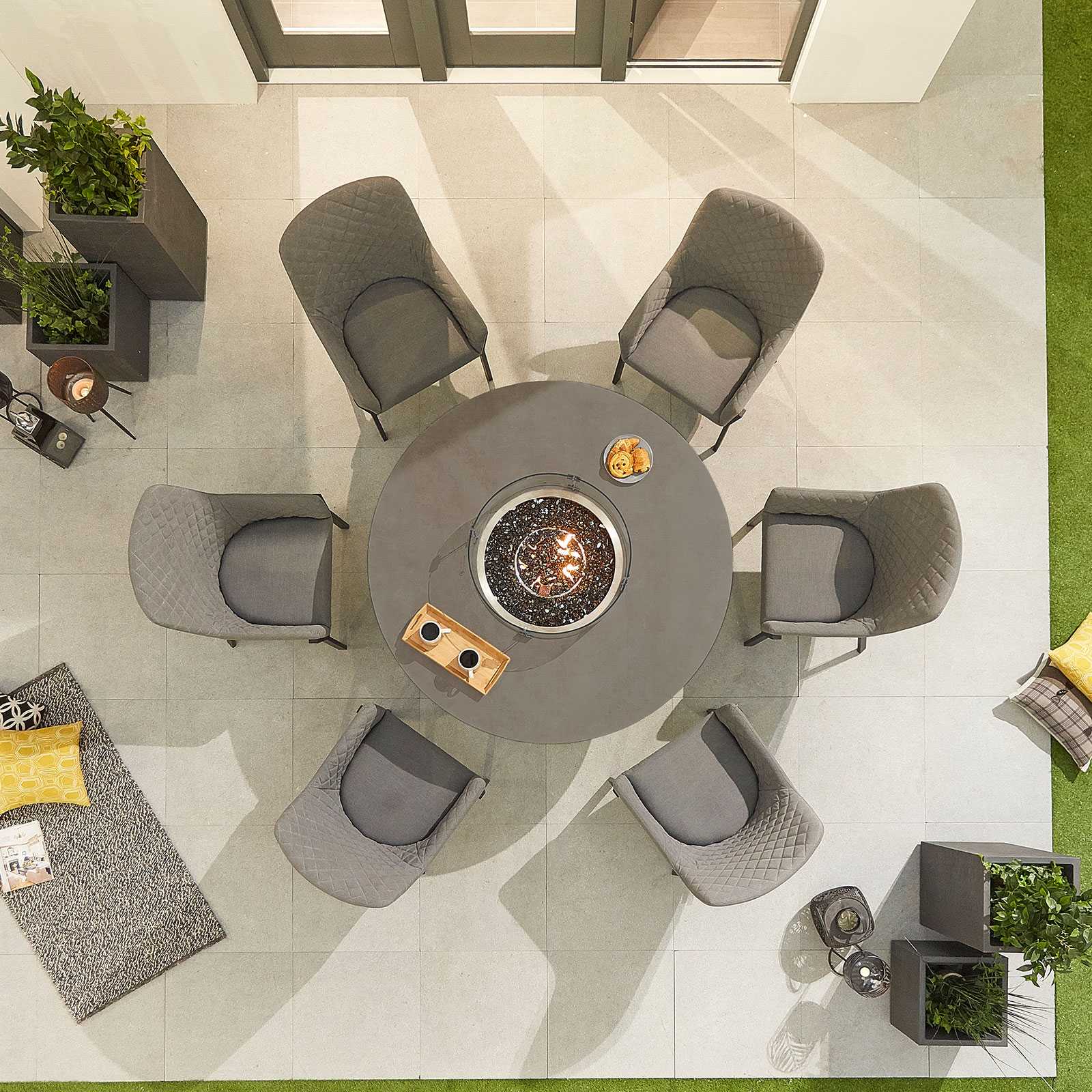 Aerial view of a six seat round firepit table and chairs 